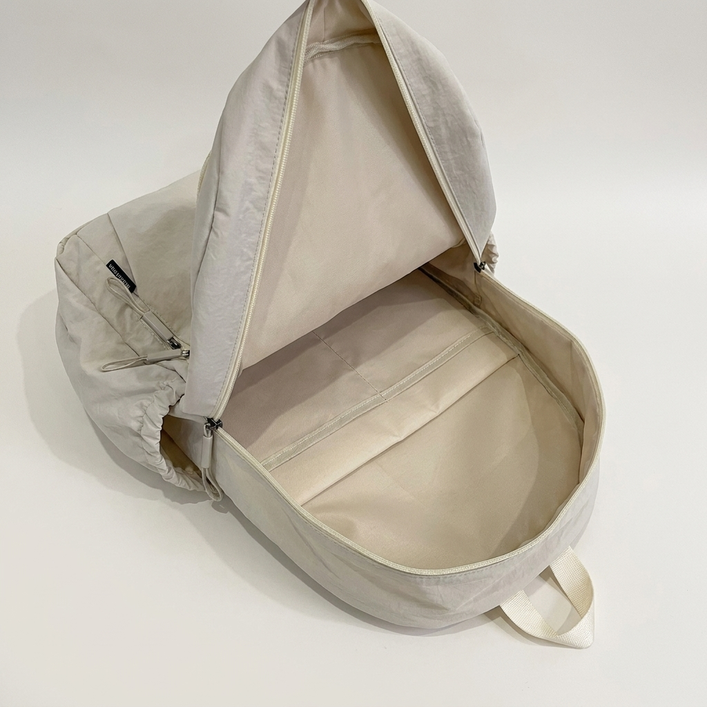 Twin interior compartments and 20-35L space for books and tech