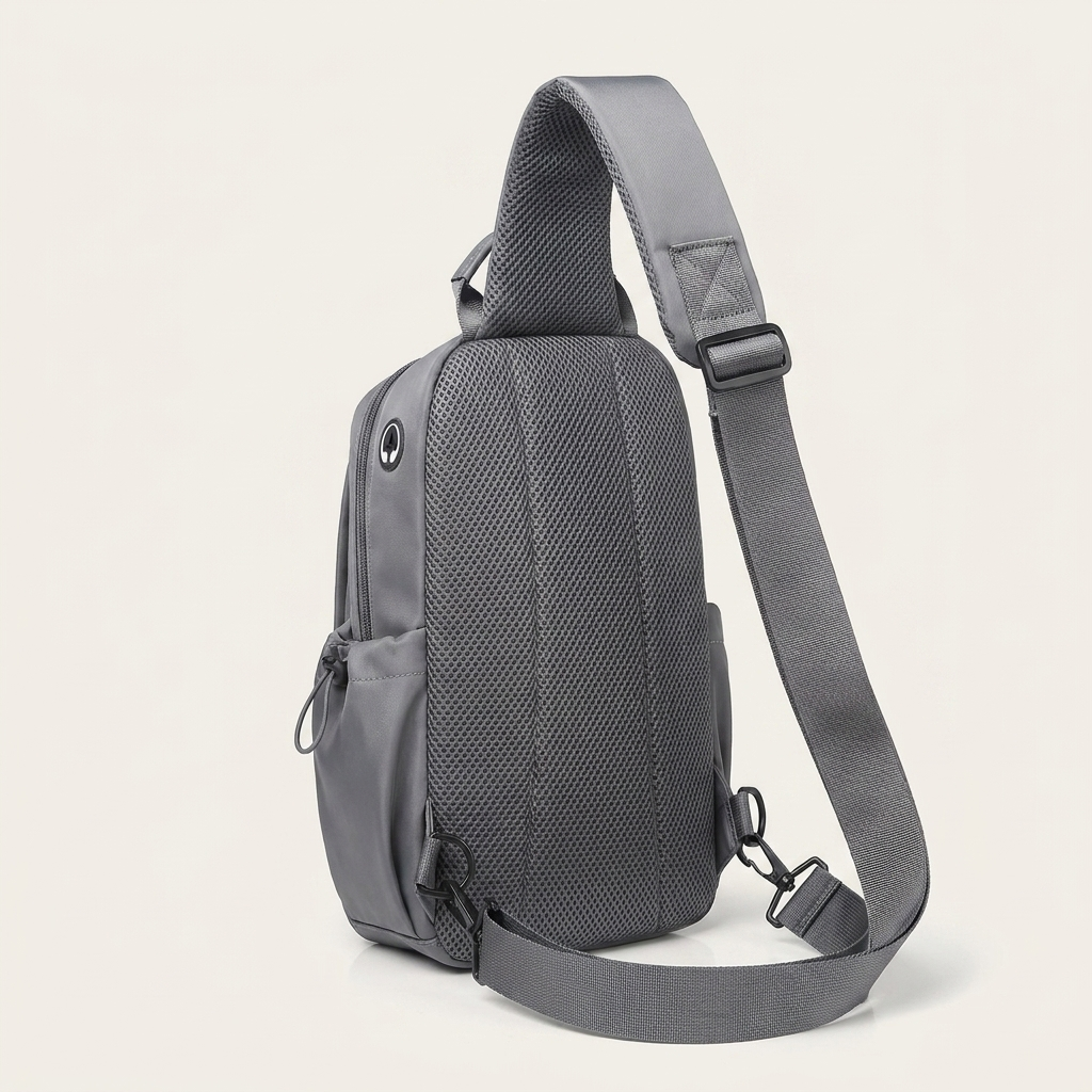 Minimalist chest bag with a subtle logo-emblem panel finish