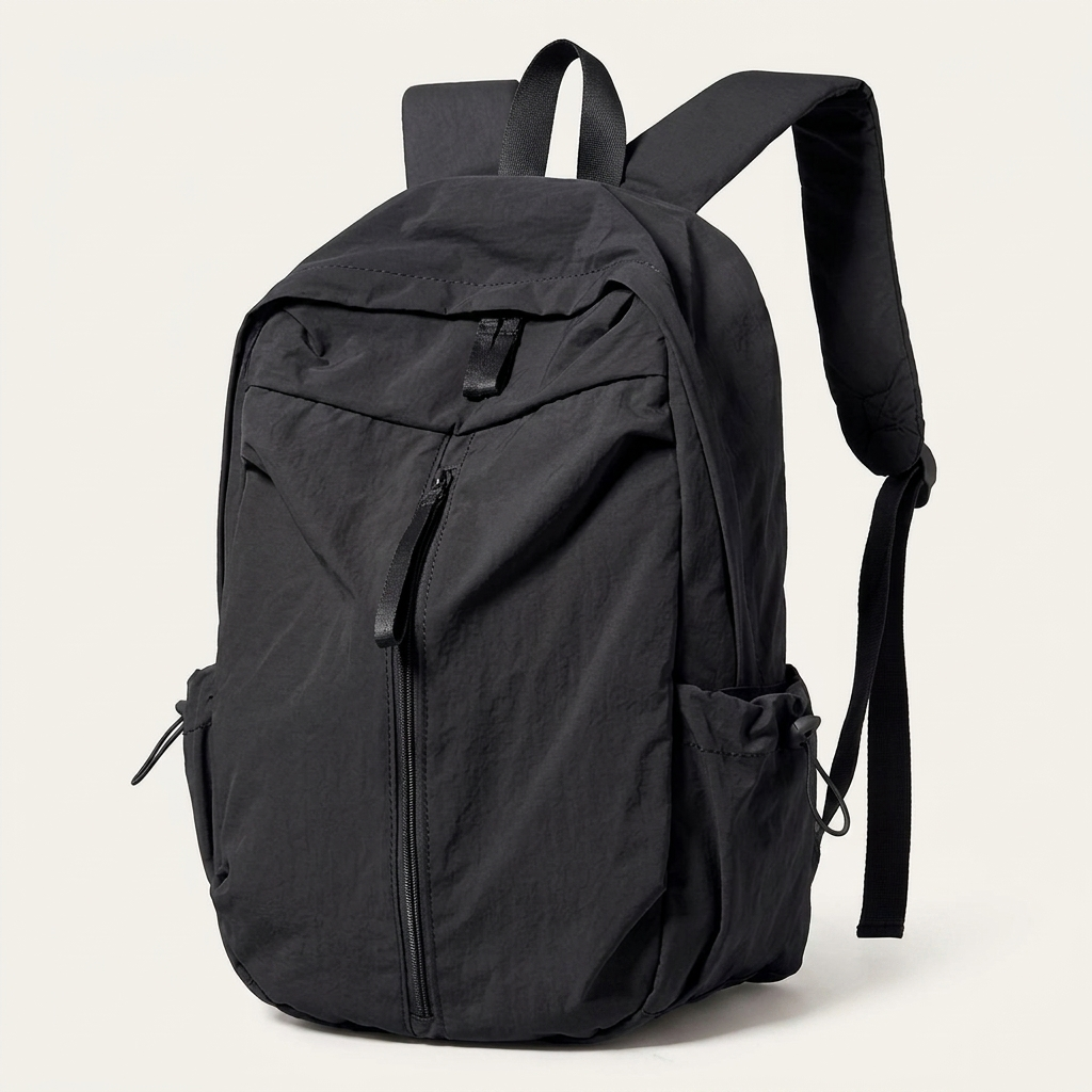 Minimalist solid-colour nylon backpack offered in eight different colourways