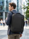 All-black business commuter backpack with logo-free minimalist urban styling