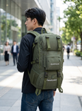 Outdoor rucksack with a main compartment expanding from 36 to 55 litres