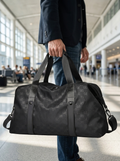 Foldable travel holdall with wipe-clean waterproof membrane shell