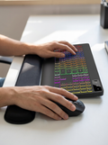 Wireless keyboard and mouse set with an integrated cushioned wrist rest
