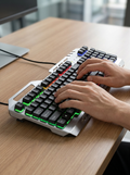 Wired mechanical gaming keyboard with a brushed metal top panel