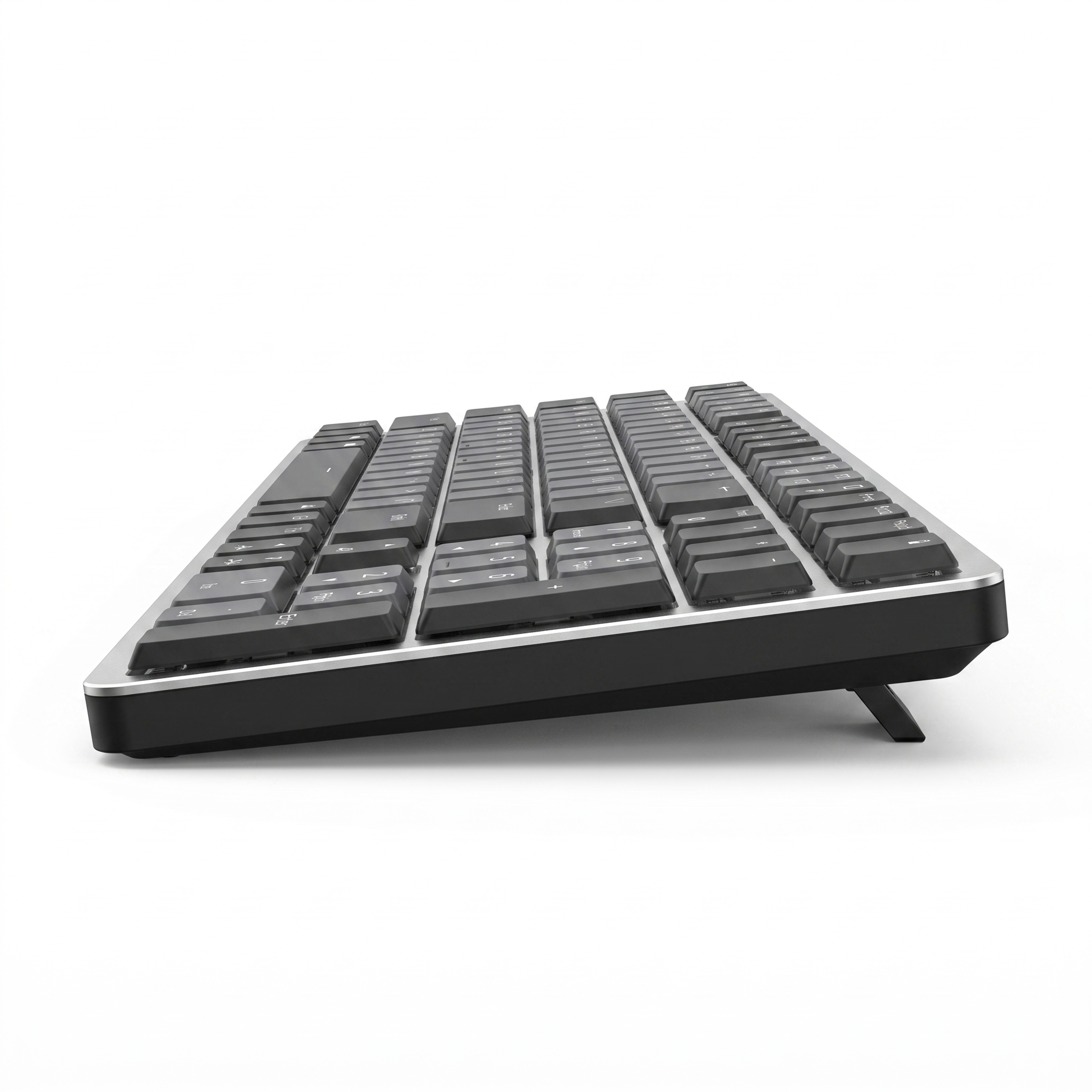 Side profile of the slim mechanical keyboard with the fold-out tilt legs extended