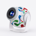 Football-patterned spherical mini projector on a white background, tilted in its white yoke stand
