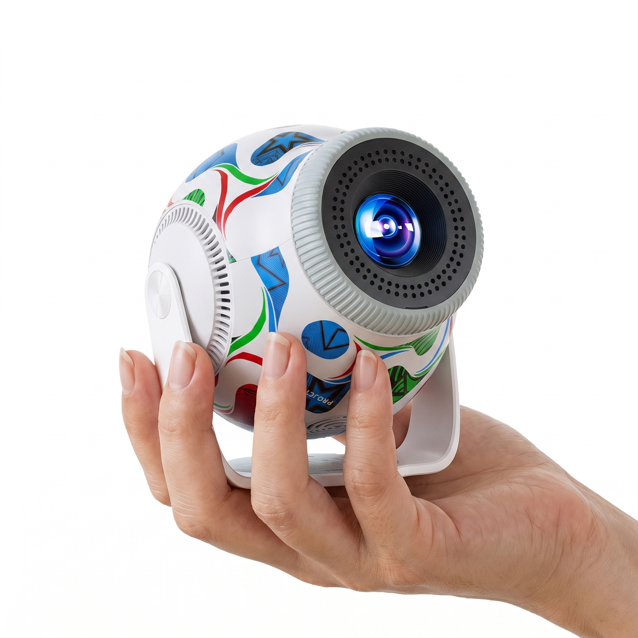 Football mini projector held in one hand, showing how compact and portable it is